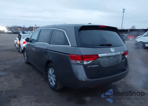 2016 Honda Odyssey Se z USA, uszkodzony, nr VIN 5FNRL5H32GB005156